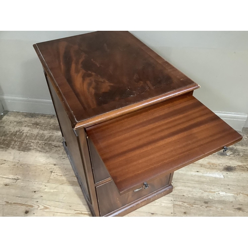 81 - A mahogany finished filing cabinet chest with pull out slide, 50cm wide by 67cm deep by79cm high