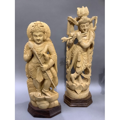 10 - Four Indian carved balsa wood figures of Shiva and three other Indian deities, measuring approximate... 