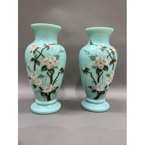 20 - A pair of Victorian duck egg blue glass vases of baluster form, hand painted with apple blossom, 26c... 