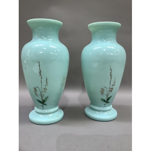 20 - A pair of Victorian duck egg blue glass vases of baluster form, hand painted with apple blossom, 26c... 