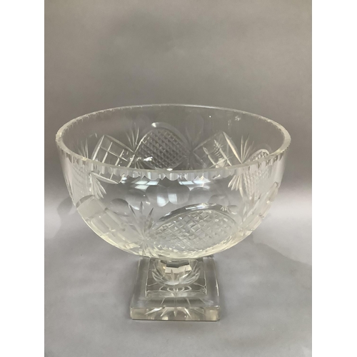 30 - An early 20th century cut glass pedestal fruit bowl cut with panels of diamonds and ovals,  panel cu... 