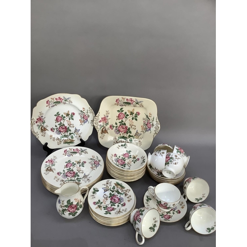 106 - A Wedgwood tea and dinner service of Charnwood design, comprising eight cups, eight saucers, eight t... 