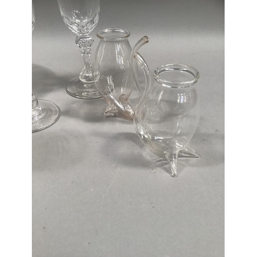 108 - A cut glass sherry decanter together with five long stemmed panel cut sherry glasses on conical foot... 