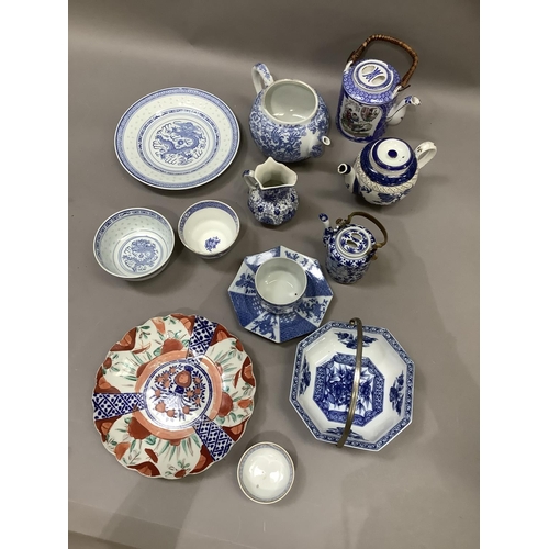 123 - A quantity of blue and white English and Chinese pottery together with an Imari plate