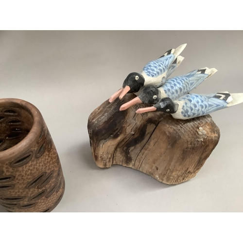 63 - A turned treen pedestal fruit bowl, together with a model of a wading bird, seahorse, seagulls on dr... 