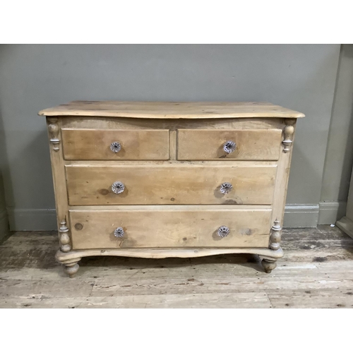 76 - A Victorian pine chest of drawers, the top of serpentine outline above two short and two long gradua... 