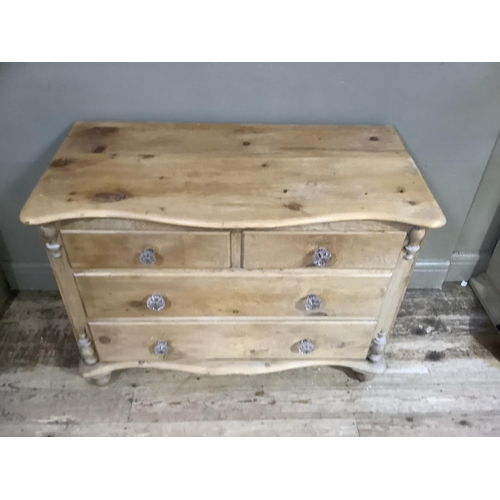 76 - A Victorian pine chest of drawers, the top of serpentine outline above two short and two long gradua... 