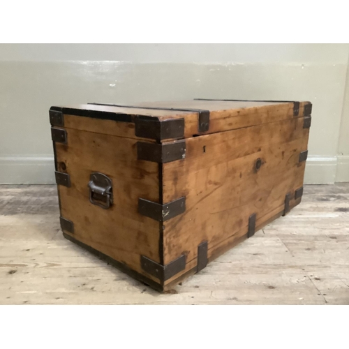 84 - A pine and iron mounted lodging box with iron side carrying handles, 92cm wide x 47cm deep x 46cm hi... 