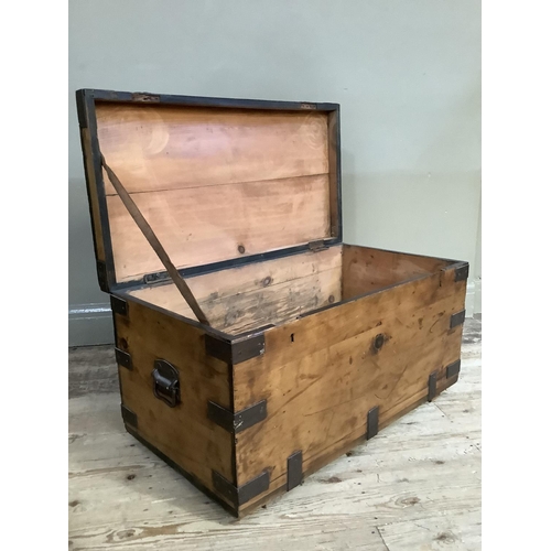 84 - A pine and iron mounted lodging box with iron side carrying handles, 92cm wide x 47cm deep x 46cm hi... 