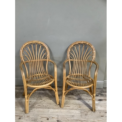 93 - A pair of bamboo and cane open armchairs