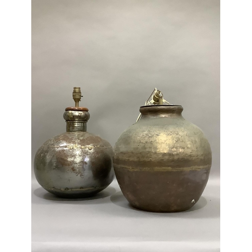 343 - A copper table lamp of ovoid form together with another similar in tin metal