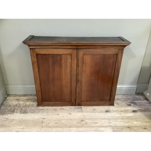 298 - A Victorian mahogany two door cupboard (the upper section from a larger piece of furniture), 113cm w... 