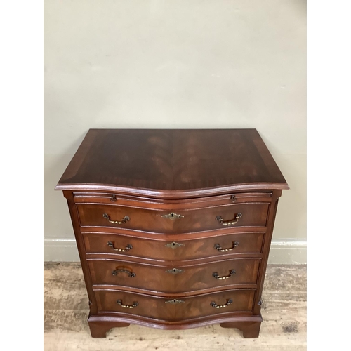 351 - A reproduction mahogany serpentine fronted chest of four long graduated drawers on bracket feet, 70c... 