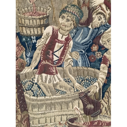 352 - A machine woven tapestry wall hanging of medieval scene together with hanging pole, 114cm wide