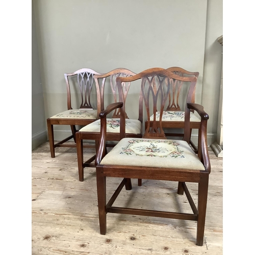 353 - A set of 19th century  mahogany dining chairs with serpentine top rail, pierced splat and floral nee... 