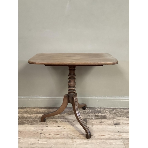 356 - A 19th century mahogany rectangular tilt top table on a turned column and three downswept legs, 82cm... 