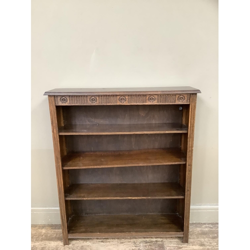 365 - An set of oak open book shelves with rose carved frieze on square legs, 91cm wide x 23cm deep x 107c... 