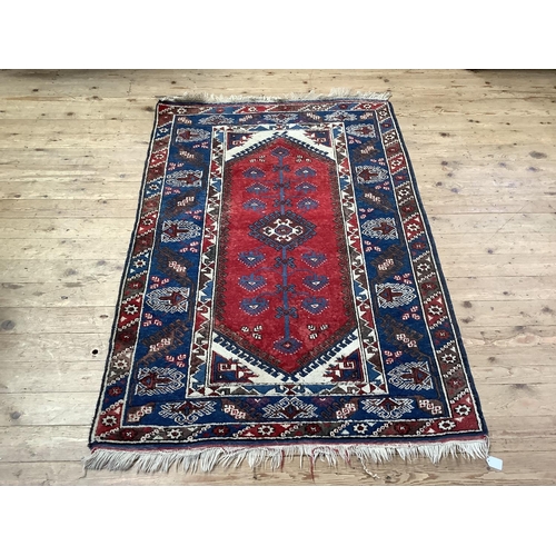 368 - A Turkish village rug, 182cm x 125cm