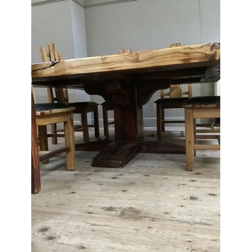 390 - A dining table and chairs by Jarobsky, made from South African railway sleepers comprising large squ... 