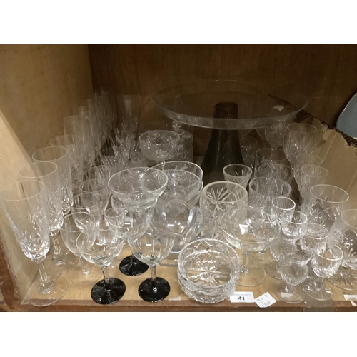 41 - A quantity of glassware including a large pedestal fruit stand and part suites of cut glass includin... 