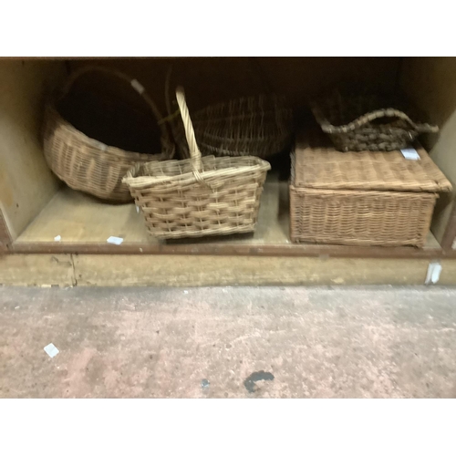 59 - A quantity of wicker baskets and hamper