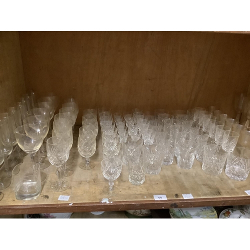 60 - A quantity of cut glass including wines, flutes, sherries, water glasses, liqueurs, various designs ... 