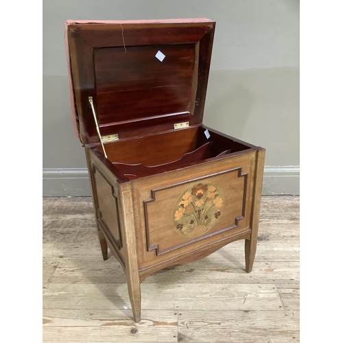 345b - An Edwardian mahogany music stool having an upholstered lift up top, the interior divided for sheet ... 