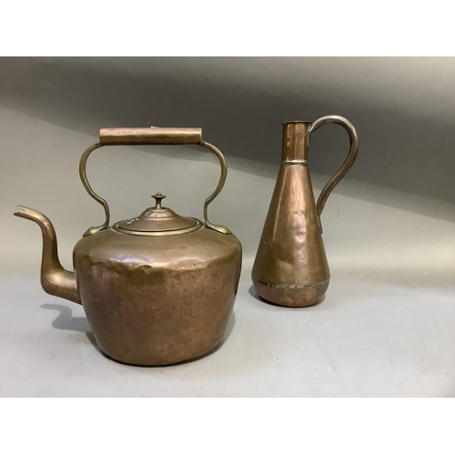 197 - A copper kettle, 28cm and a copper jug, 29cm