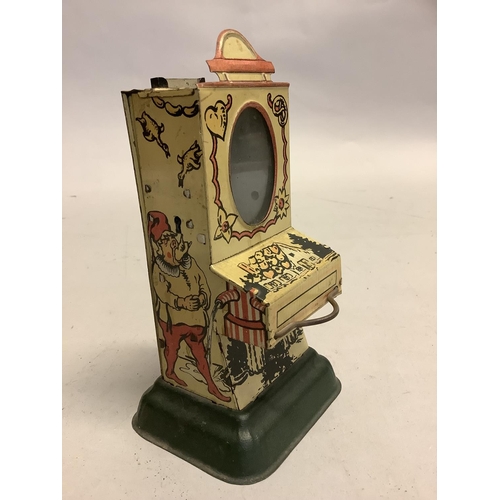 2 - An early 20th century tinplate chocolate dispenser, possibly German, of vending machine form with ov... 