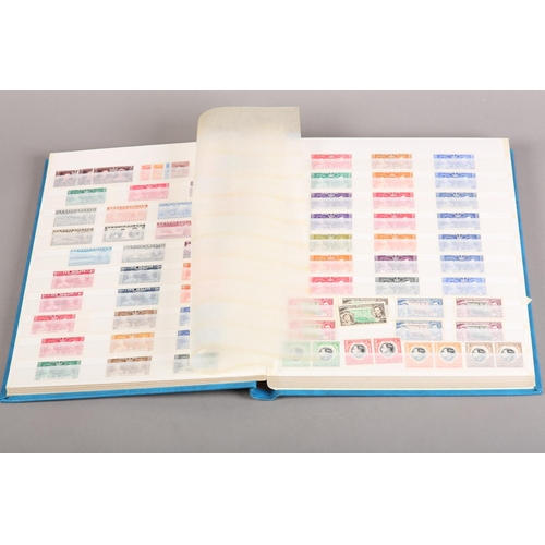 359 - One stock book with extensive and detailed collection of George V Silver  Jubilee GB Colonial Sets b... 