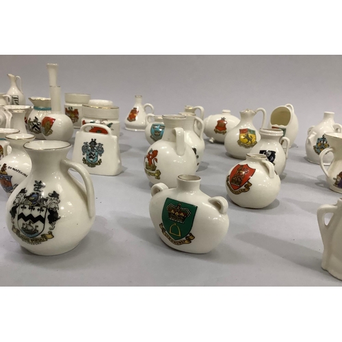 354 - W. H. Goss porcelain models, various with crests including Princess Victoria's first shoe with Isle ... 