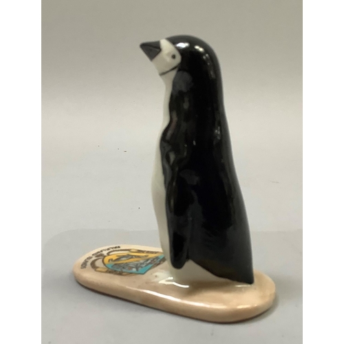 346 - A W. H. Goss porcelain model of a penguin with Falkland Islands crest, printed mark 'W. H. Goss Engl... 