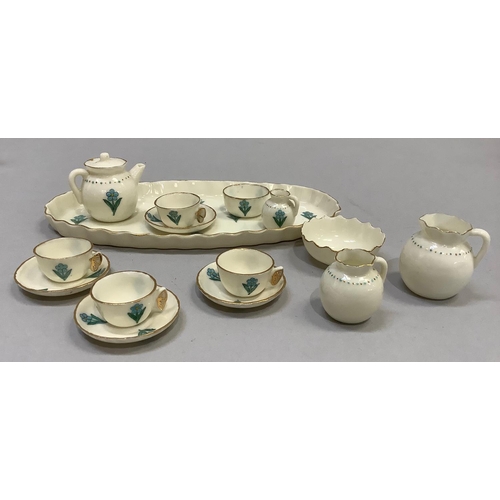 350 - A W. H. Goss porcelain miniature tea service on an oval tray (16cm long) comprising teapot, milk jug... 