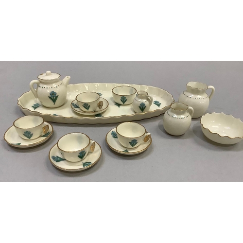 350 - A W. H. Goss porcelain miniature tea service on an oval tray (16cm long) comprising teapot, milk jug... 