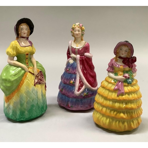 351 - A W. H. Goss porcelain figures The Bridesmaid, in yellow with pink trim, Rd. no. 769525, 14cm high, ... 