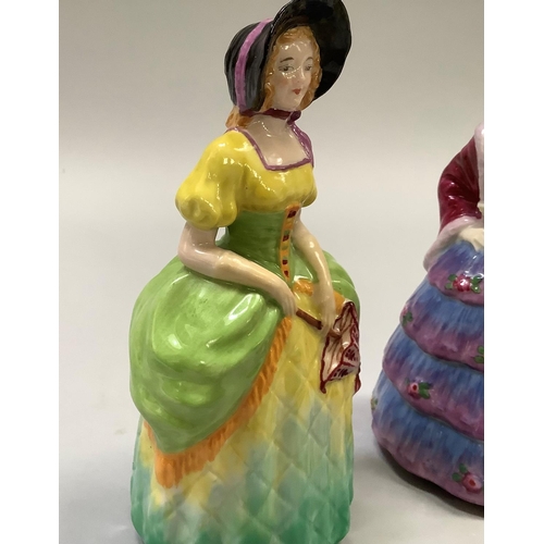 351 - A W. H. Goss porcelain figures The Bridesmaid, in yellow with pink trim, Rd. no. 769525, 14cm high, ... 