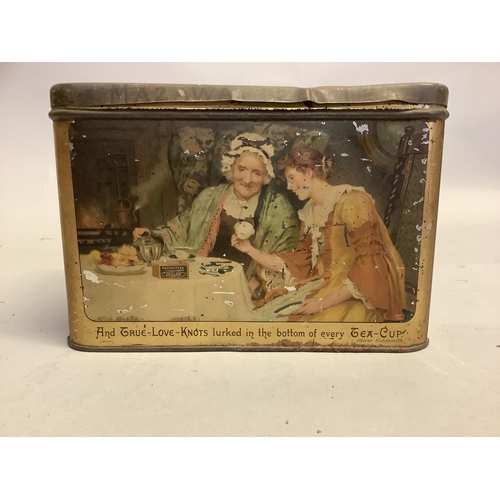 13 - An early 20th century printed tin Mazawattee tea caddy printed with a young woman looking for love-k... 