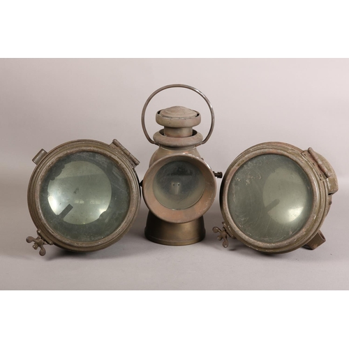 144 - A pair of Miller military transport acetylene headlights with ordnance benchmark, together with a Lu... 