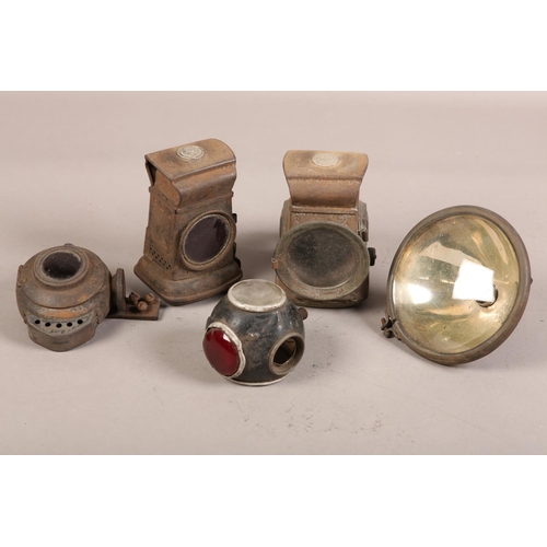 148 - A set of Lucas King of the Road motorcycle oil lamps with lenses, a B210 electric rear light, a Mote... 