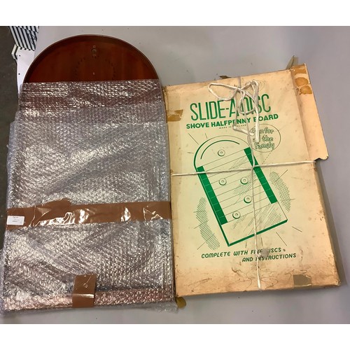 262 - A Slide-A-Disc shove halfpenny board in original box together with a Holey Bogey Corinthian bagatell... 