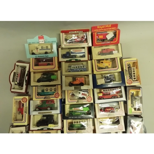 296 - A large quantity of Days Gone die cast models, including buses, lorries, trucks and horse-drawn vehi... 