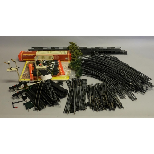 307 - A large quantity of Hornby track and accessories, including varying radius curves, long and short st... 