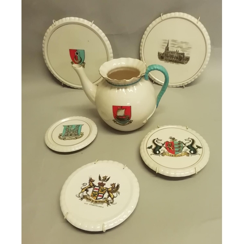 320 - W. H. Goss porcelain tea pot with Newport I. W crest 14.5cm high and two teapot stands with Southsea... 