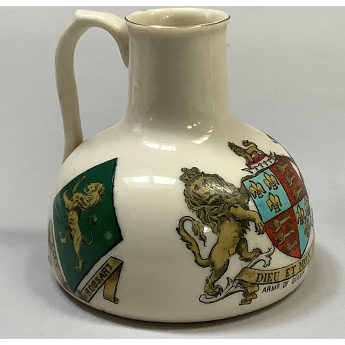 326 - A W. H. Goss model of the Elizabeth Jug with the Arms of Queen Elizabeth, 8.5cm high; Urn found at O... 