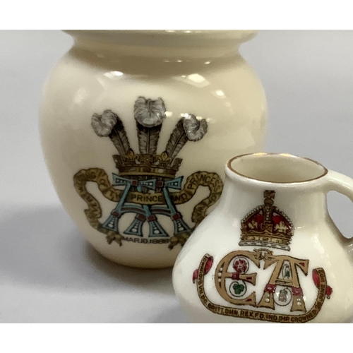 326 - A W. H. Goss model of the Elizabeth Jug with the Arms of Queen Elizabeth, 8.5cm high; Urn found at O... 