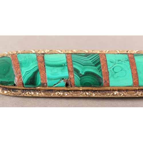 410 - A VICTORIAN MALACHITE BROOCH, collet set within an elongated oval interspaced with strips of red aga... 