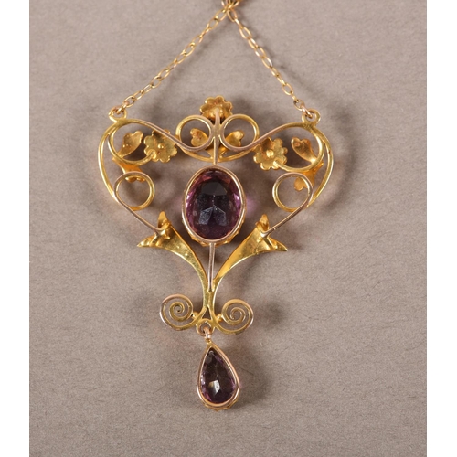 412 - A LATE VICTORIAN AMETHYST AND SEED PEARL HEART SHAPED PENDANT and chain in 9ct gold, the oval circul... 