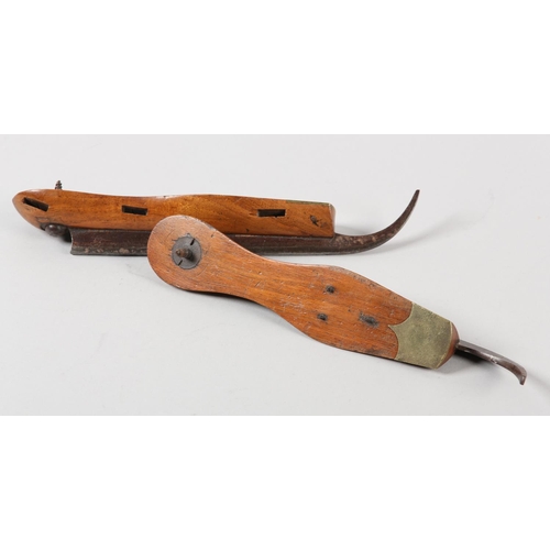 68 - A PAIR OF VICTORIAN ICE SKATES BY VERGETTE, brass tipped and with steel blades, 25.5cm long