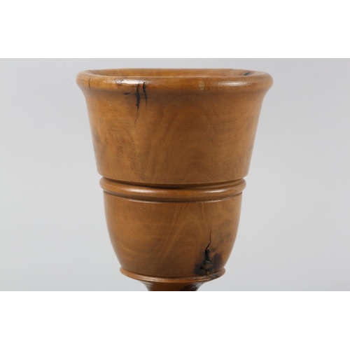 56 - A TURNED FRUITWOOD GOBLET, 17.5cm high