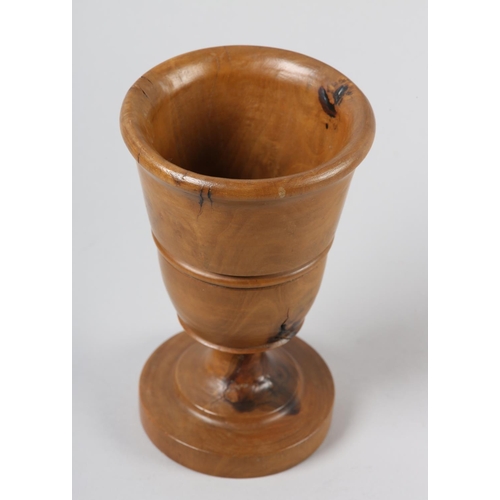 56 - A TURNED FRUITWOOD GOBLET, 17.5cm high